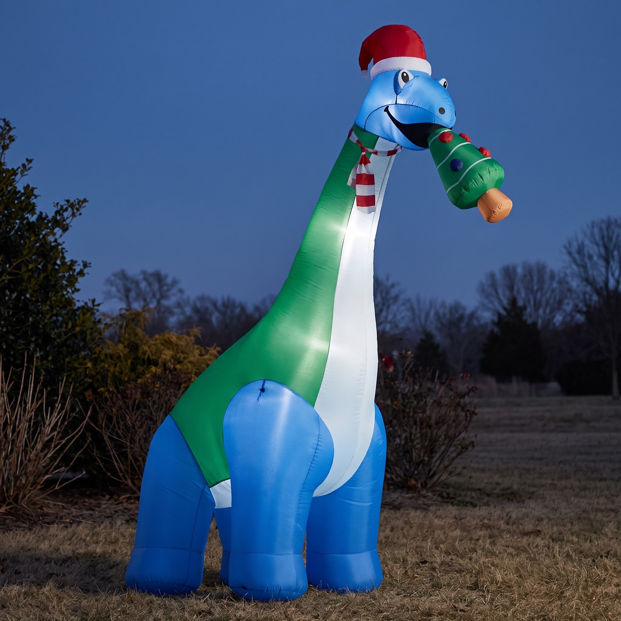 11 ft Christmas Dinosaur Inflatable with Tree and LEDs, photo 1 of 5