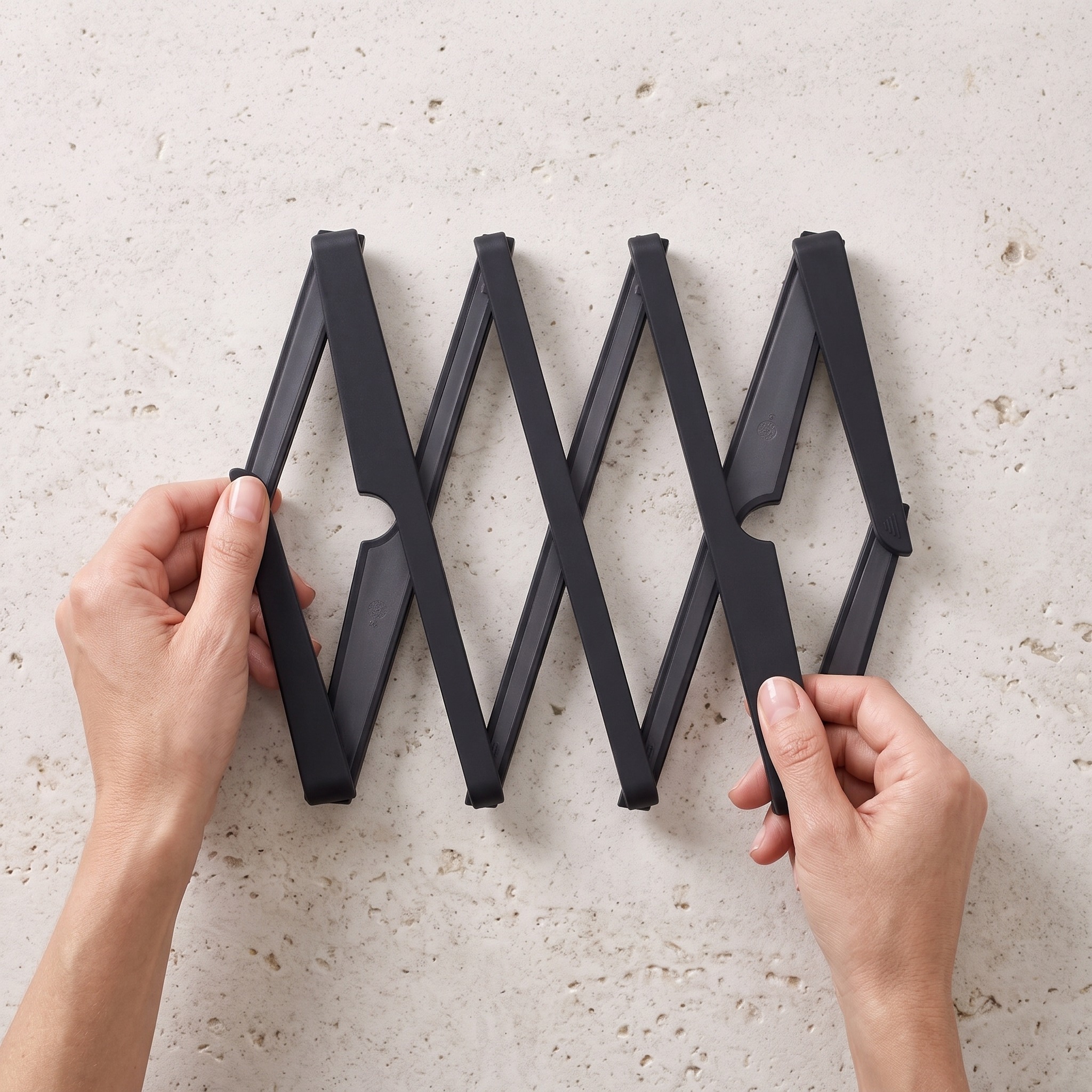 Expandable Trivet with Folding Arms, Black Silicone, photo 3 of 5