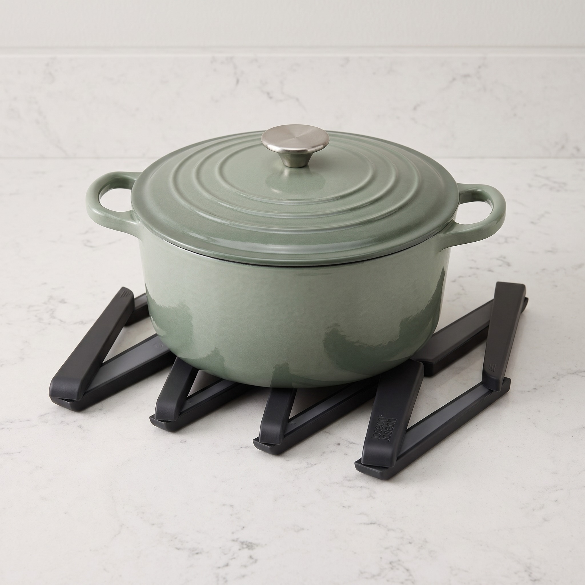 Expandable Trivet with Folding Arms, Black Silicone, photo 4 of 5
